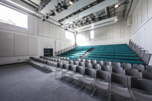 Photo of the inside of the main conference hall in the Leigh Academy Blackheath building.