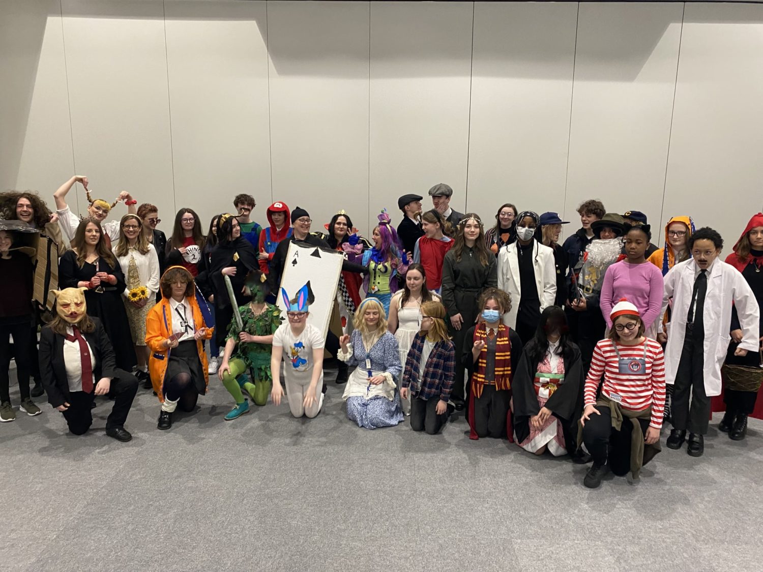 A large group of LAB students are pictured posing for the camera together, wearing their fancy dress outfits for World Book Day 2022.