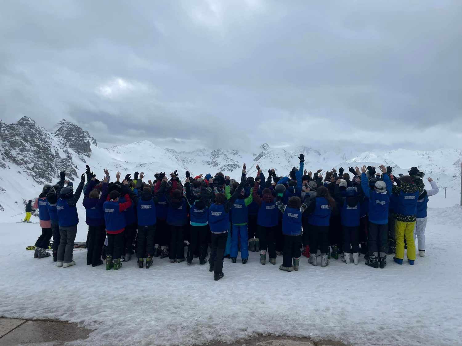 A large group of LAB students are pictured huddled together in a crowd whilst on a Ski Trip in Austria.