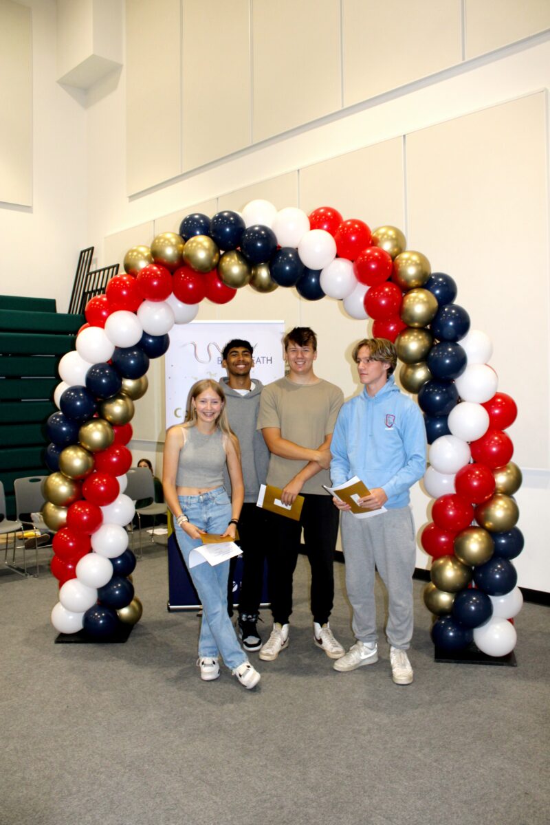 Students holding their results